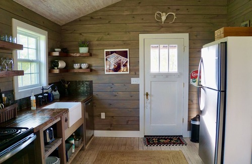 Round Top Cabina | Molly Cabin - Private cabin with 2 bedrooms, one queen and one king bed, full bath with walk-n-shower. Full kitchen with fridge/ice maker, coffee bar, front and back porches, private out door fire pit, outdoor shower.