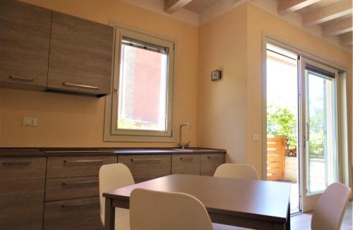 Punta Ala Apartamento | Monolocale con giardino a 100m dal mare Punta Ala