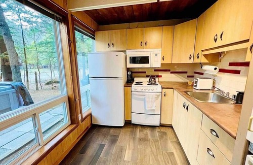 Orford Chalet De Esquí | Montagnard-SPA-Mont-Orford-SEPAQ-Wood fireplace