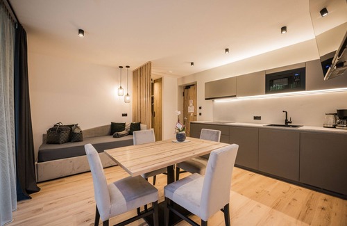 Villabassa Apartamento | Montanaris Alpine~Active~RelaxThe base camp with pool and saunas in the Dolomites.