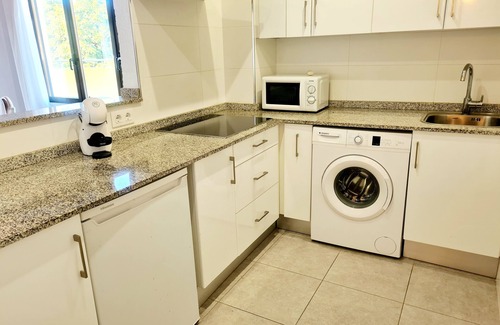 Paichi Apartamento | Moraira Town Centre Apartment with Communal Pool & Gardens.
