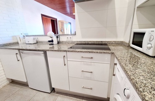 Paichi Apartamento | Moraira Town Centre Apartment with Communal Pool & Gardens.