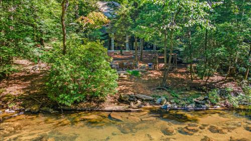 Ellijay Casa | Mountaintown Creek Lodge - Creek Front Fish Cabin - Creekside Relaxation With Fishing, Firepit, Hot Tub, Free-Standing Gas Heate