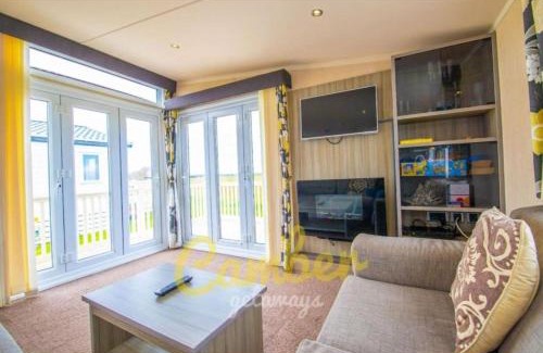 Camber Complejo | MP502 - Camber Sands Holiday Park - Sleeps 6 - Small Dog - Gated Decking - Amazing Marsh Views