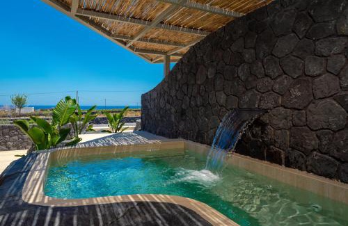 Kamari Cama Y Desayuno | Mperes Villas