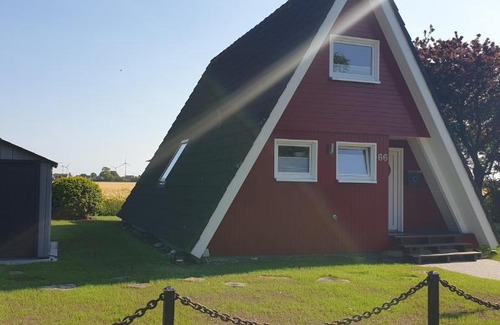Carolinensiel Casa | Murmel 3 - Strandkorb, Wallbox, WLan, Kamin