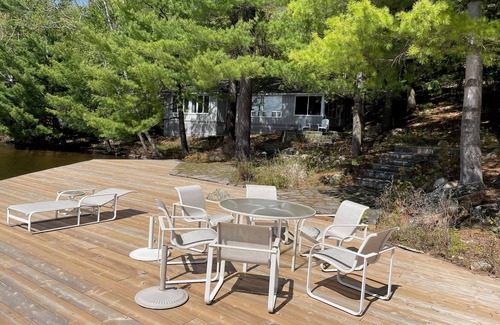 Port Carling Cabaña | Muskoka Lakes Cottage with huge dock. Southwest & sunset view