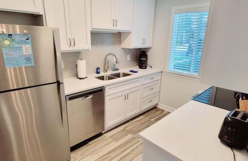 Demere Park Casa | N1 UPGRADED comfortable and well maintained bedrooms upstairs large living room screened porch