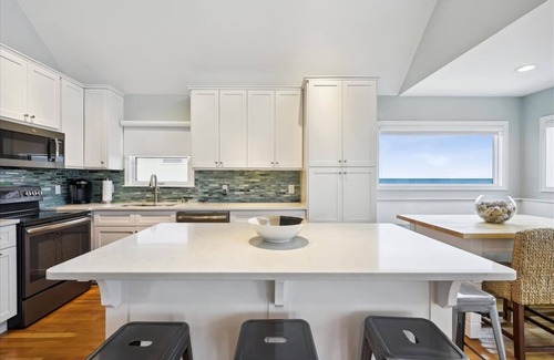 East End Casa | NATURAL SPLENDOR COMPLEMENTS Estilo contemporáneo en esta belleza de playa 2BR / 2BA.