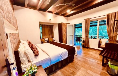 Giridih Hotel | Nature Valley Farmhouse Resort by Raarees, Munnar #lap of nature #premium rooms #parking #Scenic view #garden with fireplace #property of the year