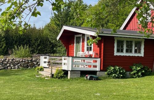Arkelstorp Cabina | Naturnära Fritidsboende, Tomtebo - YinTorp