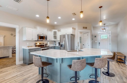 Crestview Casa | Nautical-themed retreat with a saltwater pool, fire table, full kitchen, and AC