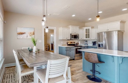 Crestview Casa | Nautical-themed retreat with a saltwater pool, fire table, full kitchen, and AC
