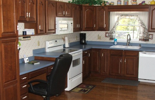 Newland Chalet De Esquí | NC Blue Ridge Mountain chalet overlooking mountain golf course