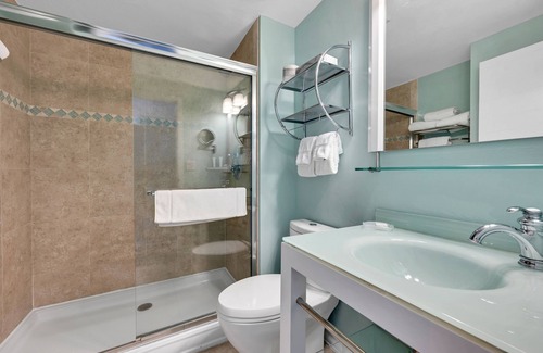 Redevelopment Area Casa | Near Shopping District! Comfortable Unit with Heated Pool, Hot Tub & Parking!