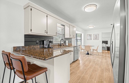 Ocala Casa | Near Silver Springs & Downtown, with 3 King Size Beds & garage game room!