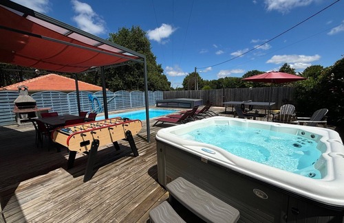 Grayan-Et-L'Hopital Casa | Cerca de soulac / mer Casa para 8 personas con piscina cubierta climatizada, jacuzzi