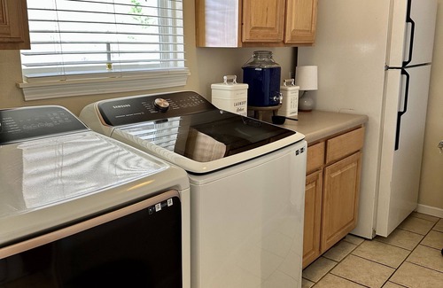 Camdenton Casa | Nestled by the 7th green, large deck areas. Movie theatre for inside or out.