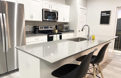 Grimes Casa | New 3 Bedroom House with attached Garage Parking
