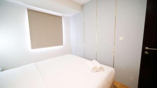 Sidoarjo Apartamento | New and Homey 2BR Apartment at Suncity Residence By Travelio