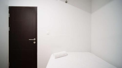 Sidoarjo Apartamento | New and Homey 2BR Apartment at Suncity Residence By Travelio