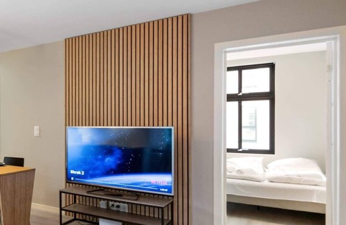Arstad Condominio | New Apt with heated flooring, fast WI-FI - smart-TV!