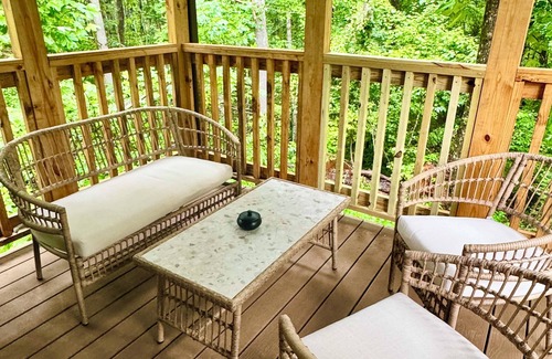 Brevard Cabaña | Tiki bar cottage with largest porch in NC and hot tub, views and fire pit!