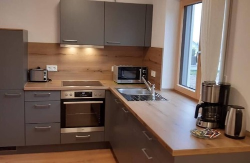 Michelsneukirchen Apartamento | New, exclusive vacation apartment (60 sqm) for 4 people with private garden and barbecue facilities