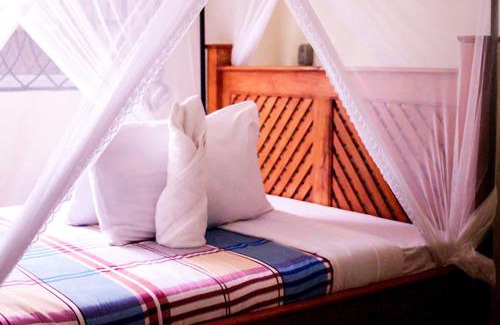 Arusha Cabina | New Favour Lodge