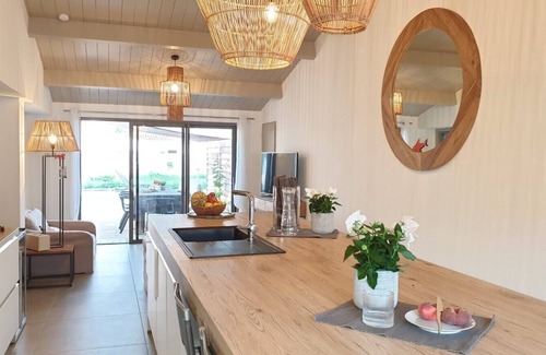 Saint-Clement-des-Baleines Casa | Nueva villa de lujo abierta al jardín y piscina climatizada a 150 metros de la costa.