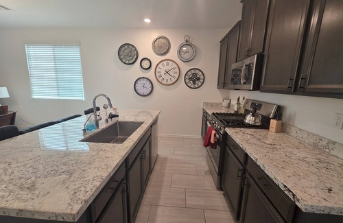 North Las Vegas Casa | New Gated Luxury: Modern gated 2 bed 2 bath home with soaking Tub, Patio, BBQ.