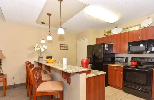 National Gardens Condominio | NEW! Harley Retreat Near Beach, Onsite Pool, WiFi!