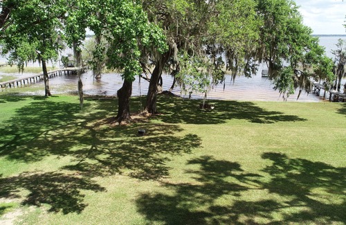 Waldo Casa | Alquiler de casa nueva! ¡6 acres en el lago Santa Fe, 4BR 3BA, 192 pies de frente de lago!