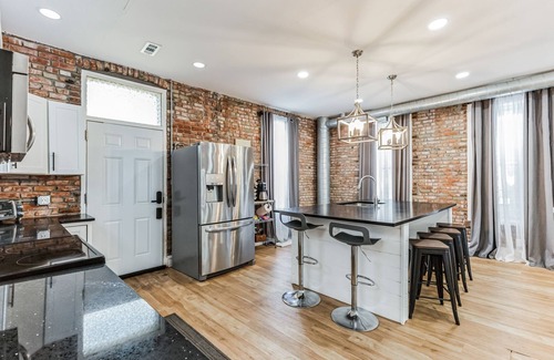 Northeast Kansas City Casa | NEW LISTING! BriKCtoria 1102 (3-Bedroom Home) - Pets Allowed