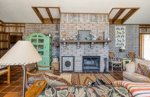 Angel Fire Casa | New listing! Lovely home filled with character w/ cozy fireplace and large patio