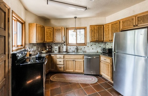 Angel Fire Casa | New listing! Lovely home filled with character w/ cozy fireplace and large patio