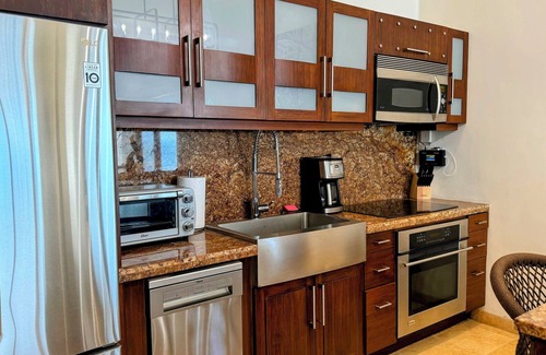 Cabo Bello Condominio | NEW LISTING! OCEANFRONT CORNER TOP FLOOR 2 BEDROOM UNFORGETTABLE VIEWS