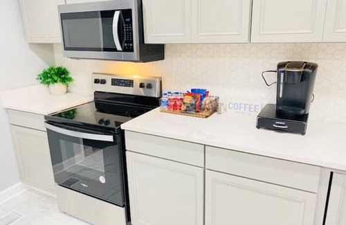 Covington Casa | “New Listing” The Latest Luxurious Blue Cheetah! 4Bed 3Bath