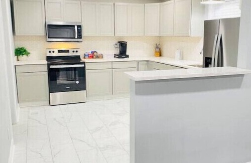 Covington Casa | “New Listing” The Latest Luxurious Blue Cheetah! 4Bed 3Bath