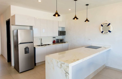 Telchac Puerto Condominio | New Modern 3BR Beachfront Condo in San Benito