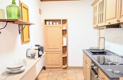 Oberammergau Apartamento | Estilo bávaro moderno con vista a la montaña frente a la famosa casa Pilatus!