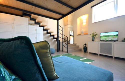 Roccaforzata Apartamento | New modern loft by FM atelier