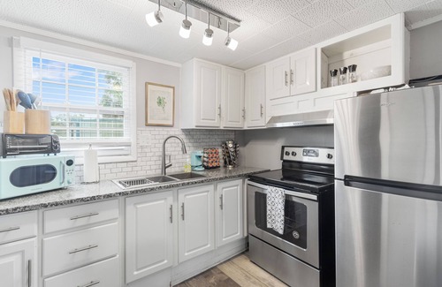 East Pensacola Heights Casa | NEW POOL NOW AVAILABLE FOR USE! Unit was meticulously furnished to give a coastal/farm house vibe