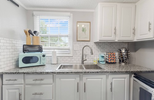 East Pensacola Heights Casa | NEW POOL NOW AVAILABLE FOR USE! Unit was meticulously furnished to give a coastal/farm house vibe