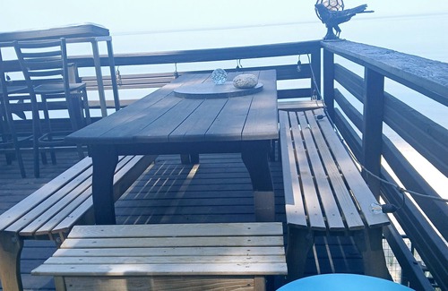 Fennville Cabaña | NEW premium charm in this 3BR cottage 150 ft of private lake frontage boatdock
