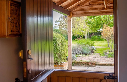 Sharrington Cabaña | Newly renovated Brick & Flint cottage with stylish interiors, wood burning stove, beautiful garden,