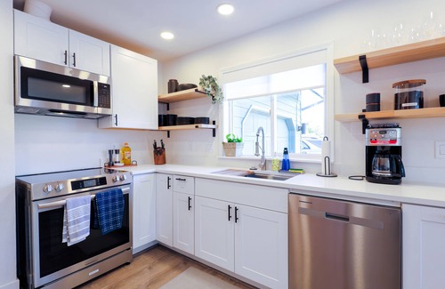 Eugene Casa | Newly renovated, centrally located home with private gate, RV parking & Hot Tub