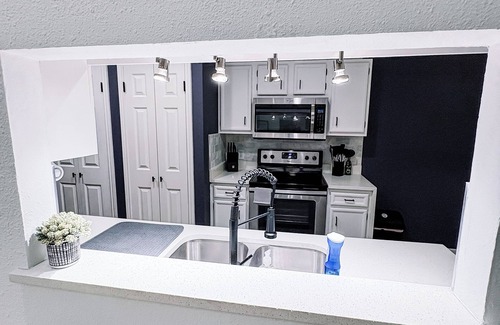 Waters Park Condominio | Newly Renovated Condo - Deck, Pet-Friendly, WFH