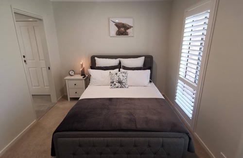 Helensvale Casa | Escondite suburbano recientemente renovado