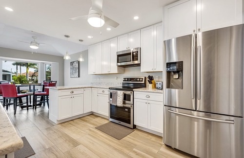 Marco Island Villa | Newly Updated Villa Heated Pool Canal Front Walk to Beach 3 min drive